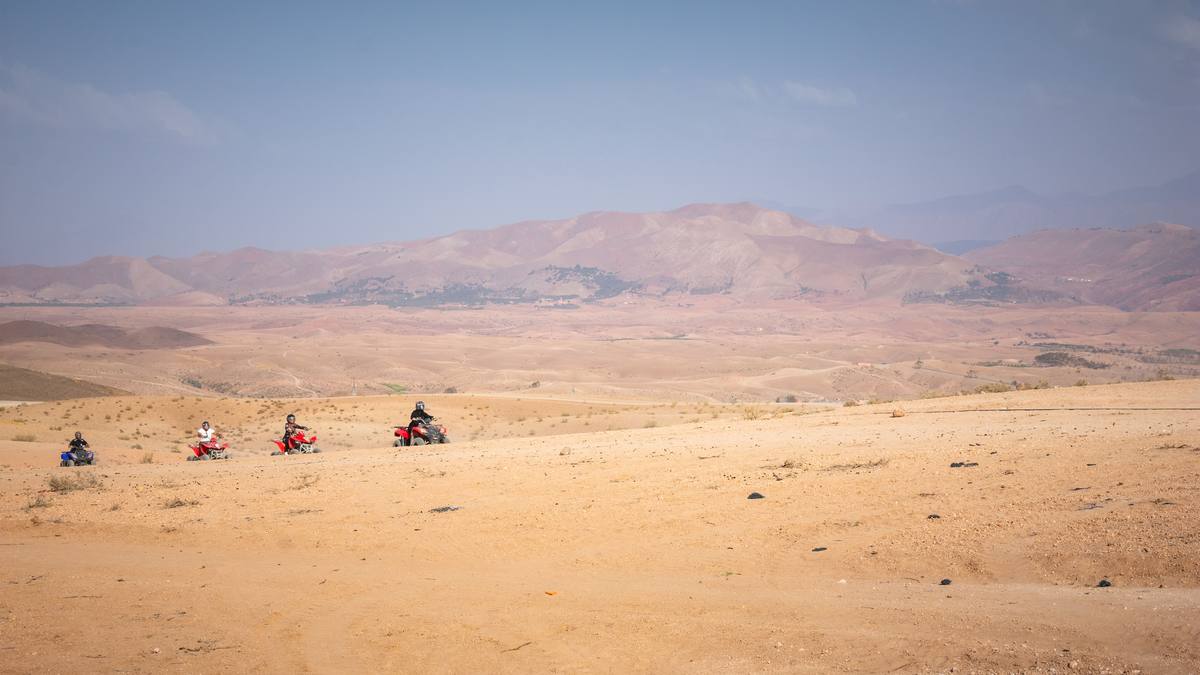Quad riders crossing the Agafay plains