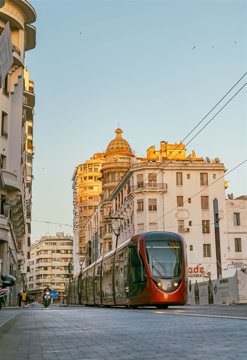 Red tram and art-deco facades downtown Casablanca Morocco