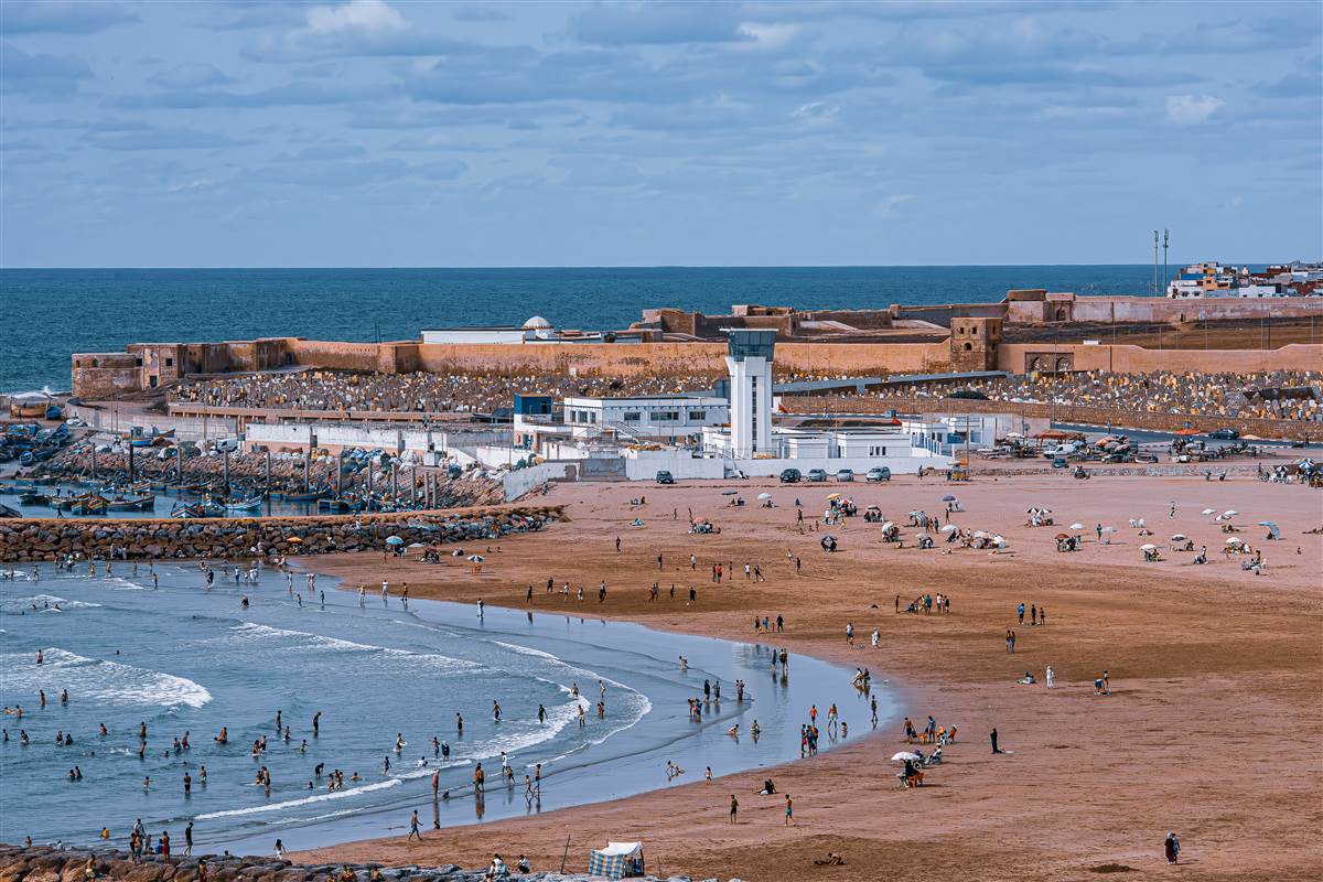 Sandy beach and Portuguese fortress ramparts El Jadida Morocco