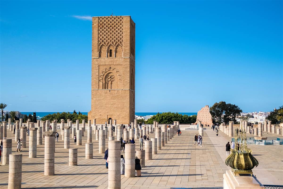 Hassan Tower and colonnade ruins under blue sky in Rabat Morocco